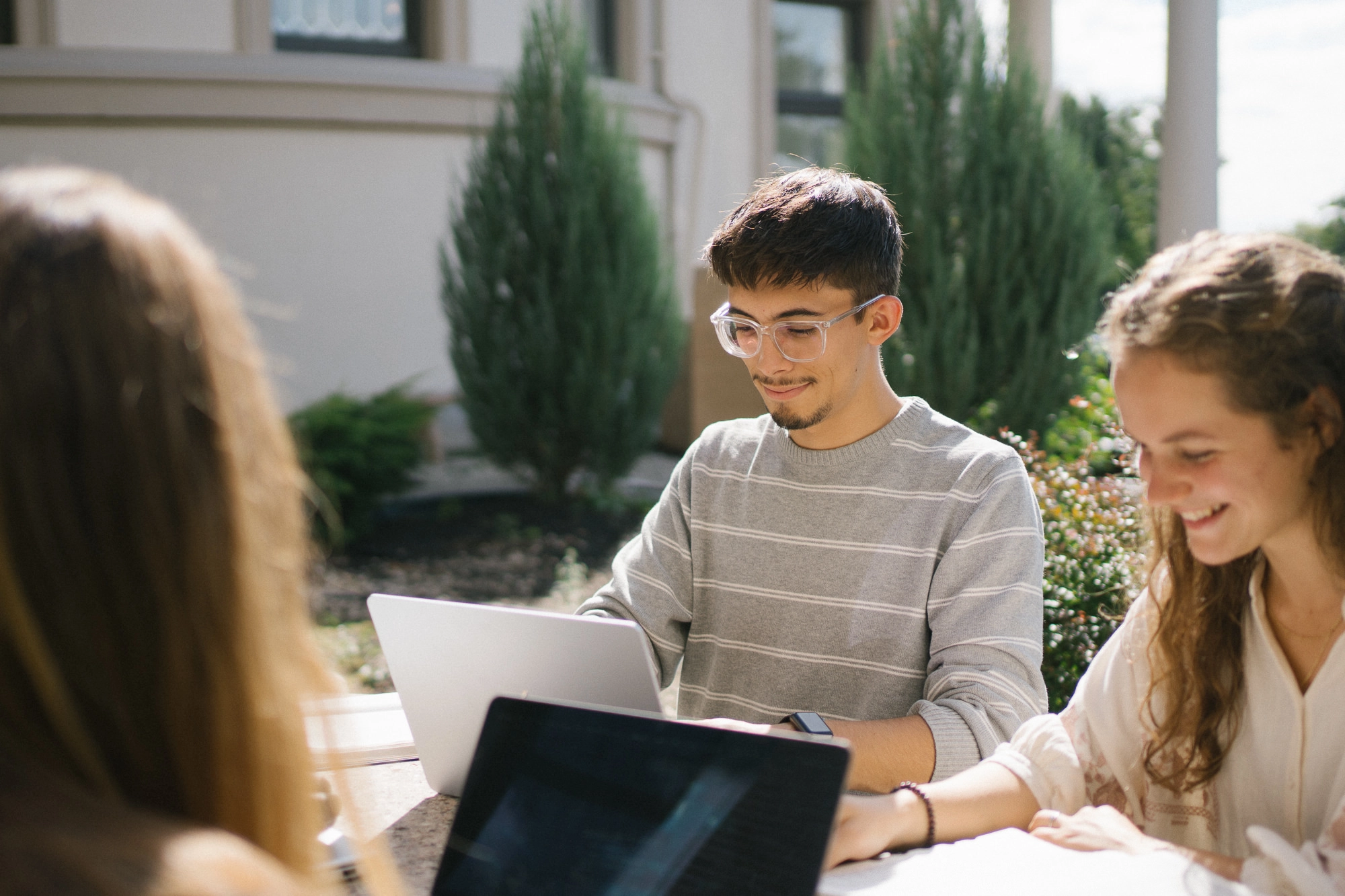 College student studying outside
